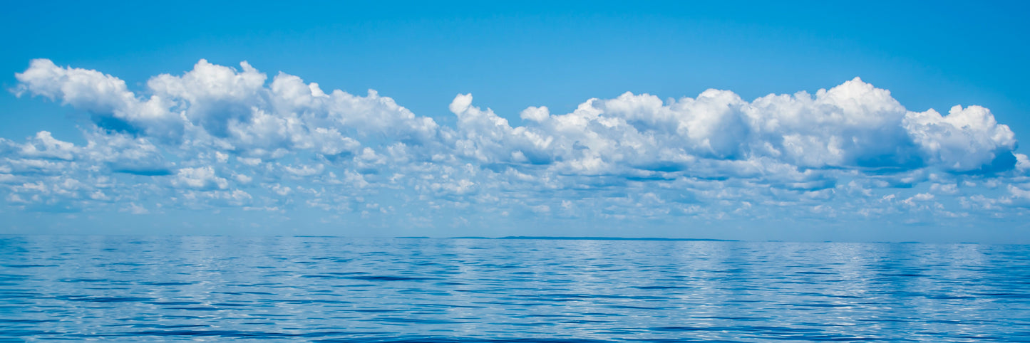 Blue Skies, White Clouds, Calm Seas